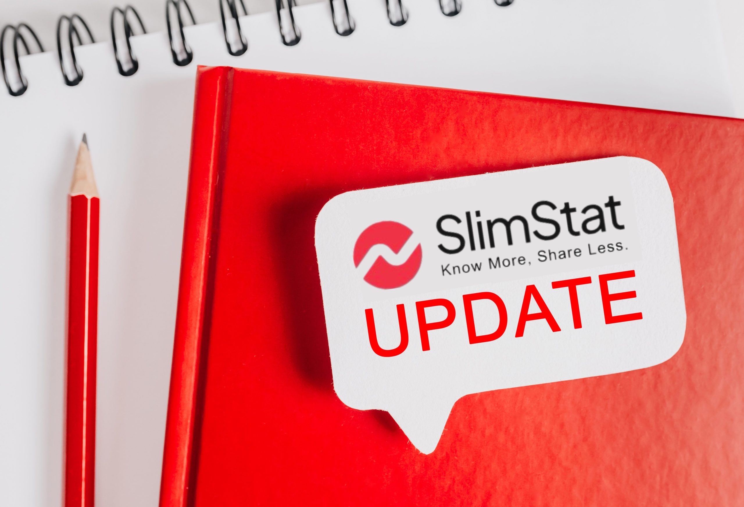 Slimstat Analytics Update — Red notebook with a speech bubble showing the Slimstat logo and the word "UPDATE" in bold red letters, symbolizing the release of version 5.3.